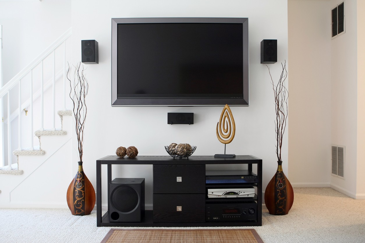 home theater system with widescreen HDTV in modern living room