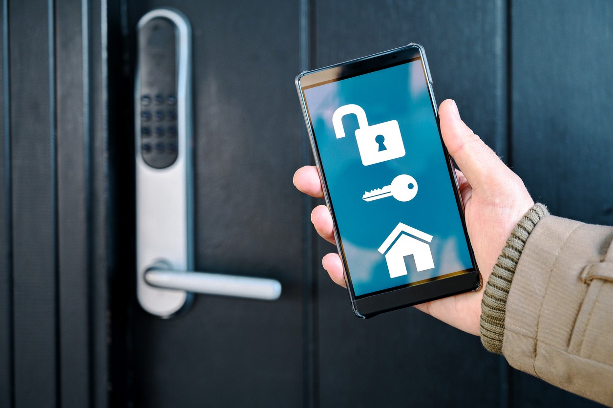 app on mobile phone unlocks electronic door lock in a smart home