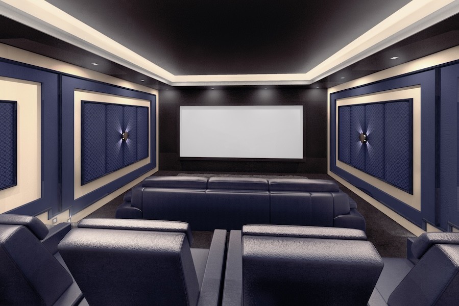 A home theater with blue leather seats, a large projector screen, and acoustic treatments on the walls.